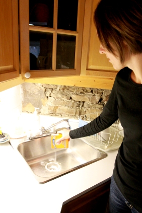 Pour baking soda into the sink